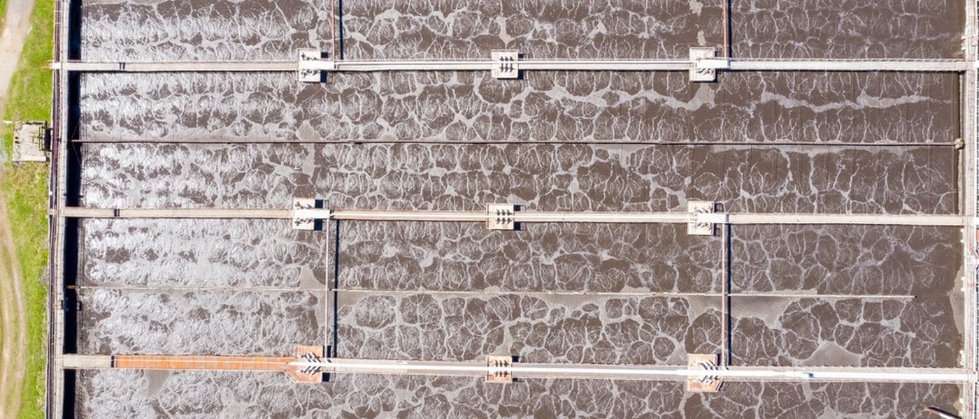 Aerial view of radial sedimentation tanks at a treatment plant.